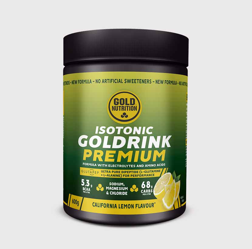 GoldNutrition GOLDRINK PREMIUM vitamins and supplements in a colorful container with tablets or powder inside.