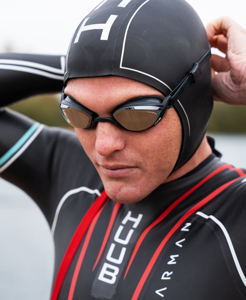HUUB Neoprene Skull Cap thermal swim hat with adjustable strap for cold water swimming.