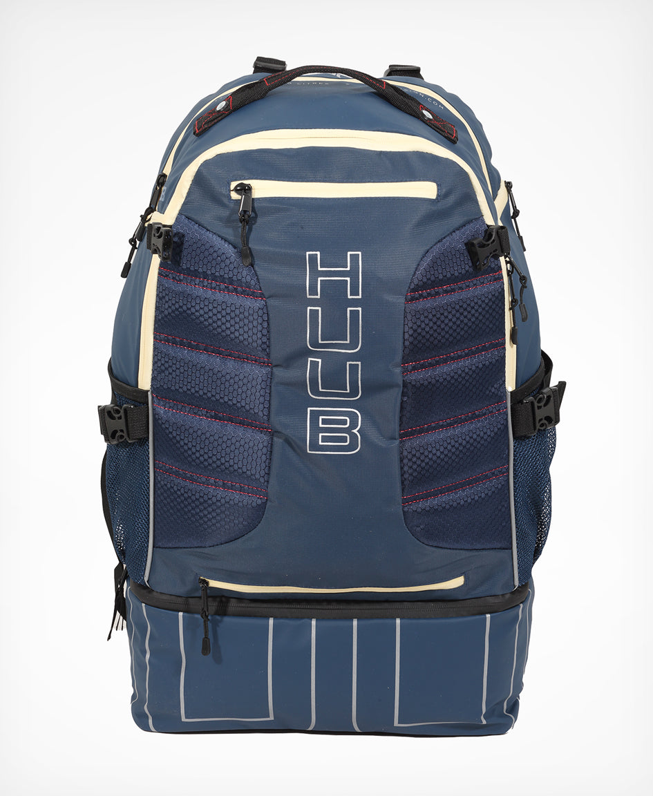 HUUB TT Bag – Transition Three, 40L rucksack, wet/dry, hidden helmet cradle, navy and olive/orange.