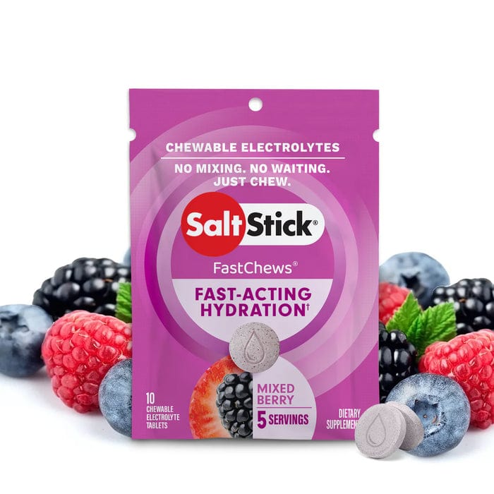 SaltStick Fastchews electrolyte replacement chews in a clear container, showing orange and lemon-lime flavored chews.